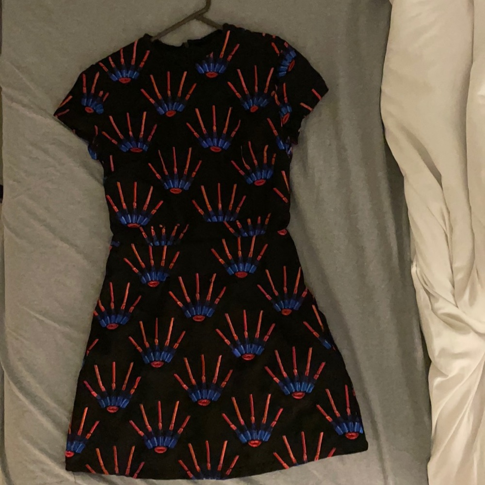 Black with orange and blue abstract print